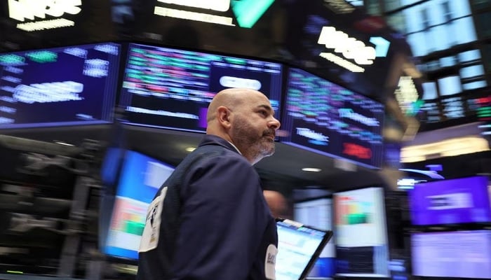 A trader works on the floor at the New York Stock Exchange (NYSE) in New York City, U.S., October 27, 2023.— Reuters