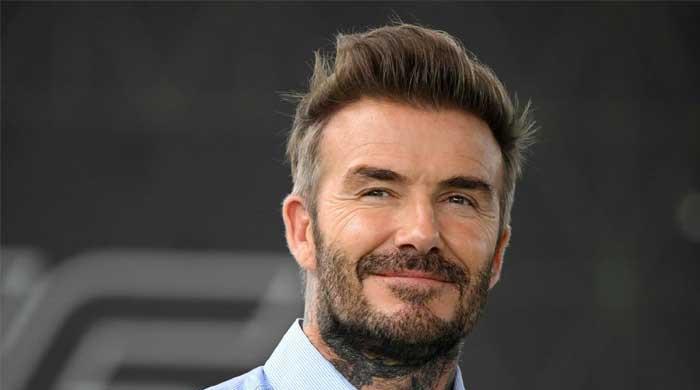 Victoria Beckham leaves David Beckham swooning over her Vogue France photos