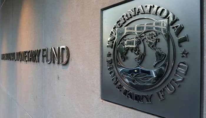 The International Monetary Fund logo is displayed on a wall in this undated picture. — Reuters/File