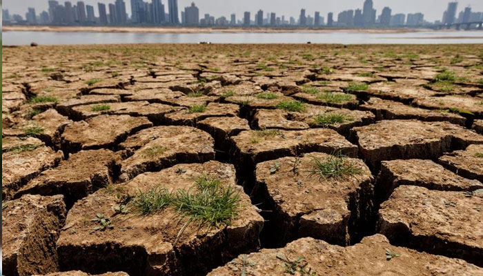 Cracks run through the partially dried-up river bed of the Gan River, a tributary to Poyang Lake during a regional drought in Nanchang, Jiangxi province, China, August 28, 2022.—Reuters