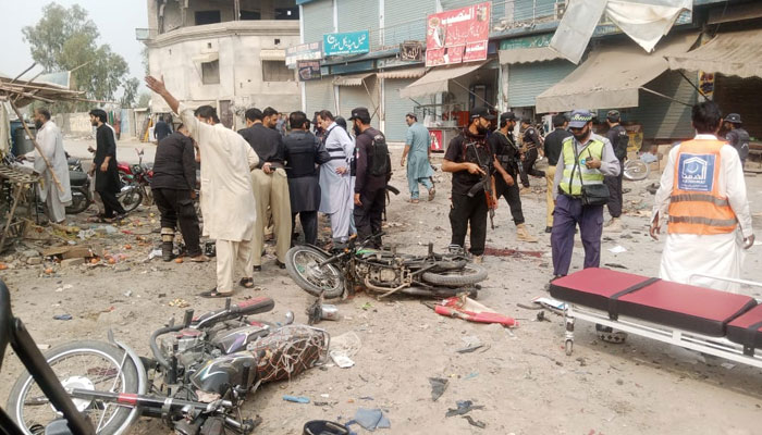 The picture shows police inspecting the area after blast in DI Khan on November 3, 2023. — Provided by the reporter