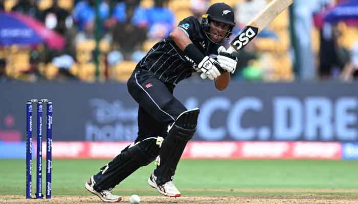 New Zealands Rachin Ravindra plays a shot during the 2023 ICC Men´s Cricket World Cup one-day international (ODI) match between New Zealand and Pakistan at the M. Chinnaswamy Stadium in Bengaluru on November 4, 2023. —AFP