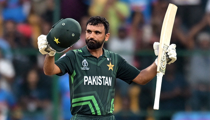 Pakistans Fakhar Zaman celebrates after reaching his century during match with New Zealand on November 4, 2024. — AFP