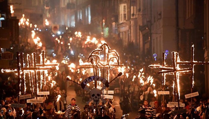 Participants parade through the town during the annual Bonfire Night festivities in Lewes, Britain, November 5, 2019. — Reuters