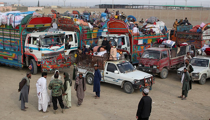 Afghan nationals gather with their belongings on vehicles as they head back to Afghanistan, after Pakistan gave a final warning to undocumented immigrants to leave, at the Friendship Gate of Chaman Border Crossing along the Pakistan-Afghanistan Border in Balochistan Province, in Chaman, Pakistan November 4, 2023. — Reuters