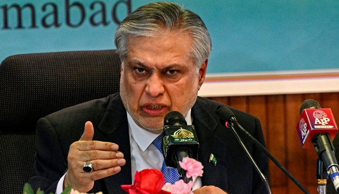 Pakistan´s finance minister Ishaq Dar speaks while presenting the economic report for fiscal year 2022-23, in Islamabad on June 8, 2023. — AFP