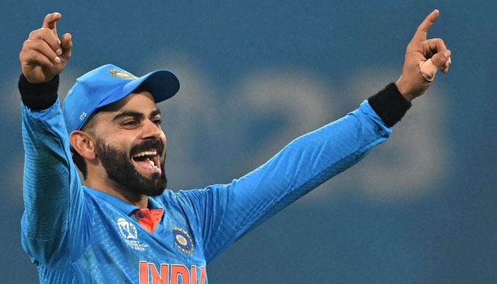 India´s Virat Kohli celebrates his team´s victory at the end of the 2023 ICC Men´s Cricket World Cup one-day international (ODI) match between India and England at the Ekana Cricket Stadium in Lucknow on October 29, 2023. — AFP
