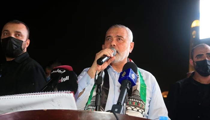 Palestinian group Hamass top leader Ismail Haniyeh speaks during a protest to express solidarity with the Palestinian people amid a flare-up of Israeli-Palestinian violence, in Doha, Qatar, May 15, 2021. — Reuters