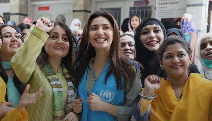 Pakistani superstar Mahira Khan surrounded apparently by some Afghan women. — Instagram/mahirahkhan