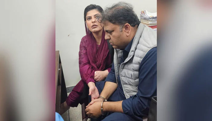 Former information minister Fawad Chaudhry is seated next to his wife Hiba Chaudhry at the court in Islamabad on November 7, 2023. — X/HibaFawadPk