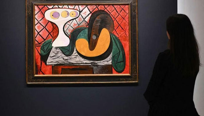 Pablo Picasso’s ‘Compotier et guitare’ during Sotheby’s fall preview in New York, on Nov 2. —AFP