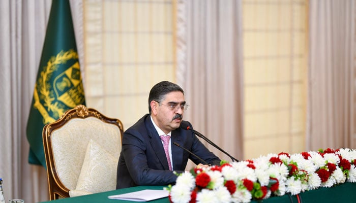 Caretaker Prime Minister Anwaar-ul-Haq Kakar addressing a press conference regarding the repatriation of illegal immigrants, Islamabad, 8 November 8, 2023. — PMO