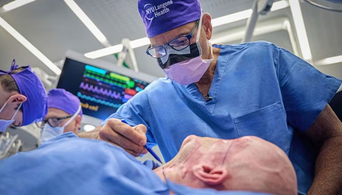 Dr. Eduardo D. Rodriguez prepares Aaron James of Hot Springs, Arkansas, for the world’s first whole-eye transplant as part of a partial face transplant at NYU Langone in New York City, U.S. May 27, 2023. — Reuters