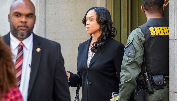 Baltimore City States Attorney Marilyn Mosby (C) departs the courthouse on the first day of the Caesar Goodson trial in Baltimore, Maryland, US, June 9, 2016. — Reuters