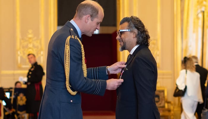 Prince William confers MBE on Faraz Khan . — X/@spectreco