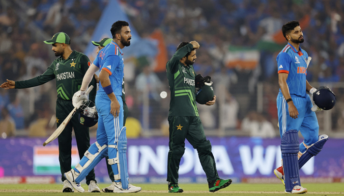 Cricket - ICC Cricket World Cup 2023 - India v Pakistan - Narendra Modi Stadium, Ahmedabad, India - October 14, 2023 Indias KL Rahul and Shreyas Iyer as the players shake hands after the match. — Reuters