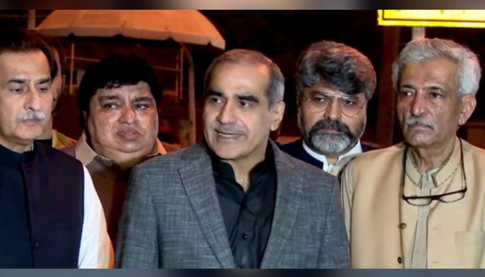 PML-N leader Khawaja Saad Rafique speaks with journalists while his fellow politicians Ayaz Sadiq, Kheel Das Kohistani, Ali Akbar Gujjar and Bashir Memon standing beside him in Karachi on November 11, 2023, in this still taken from a video. — X/@pmln_org
