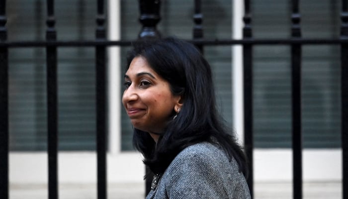 Britains Secretary of State for the Home Department Suella Braverman walks outside Number 10 Downing Street in London, Britain, October 18, 2022. — Reuters