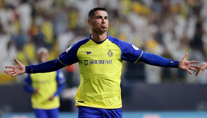 Al Nassrs Cristiano Ronaldo celebrates scoring their third goal. — Reuters