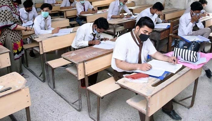 An undated photograph of students appearing for an exam. — AFP