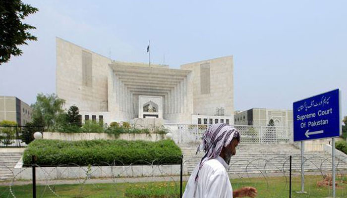 A man walks past the Supreme Court building in Islamabad, Pakistan, June 27, 2016. — Reuters