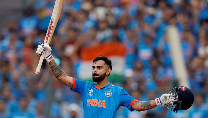 Cricket - ICC Cricket World Cup 2023 - Semi-Final - India v New Zealand - Wankhede Stadium, Mumbai, India - November 15, 2023 Indias Virat Kohli acknowledges the crowd and walks back to the pavilion after losing his wicket, caught out by New Zealands Devon Conway off the bowling of Tim Southee. — Reuters