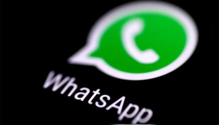 The WhatsApp messaging application is seen on a phone screen on August 3, 2017. — Reuters