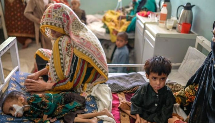 A child receives medical treatment at the Mirwais hospital in Kandahar. — AFP/File