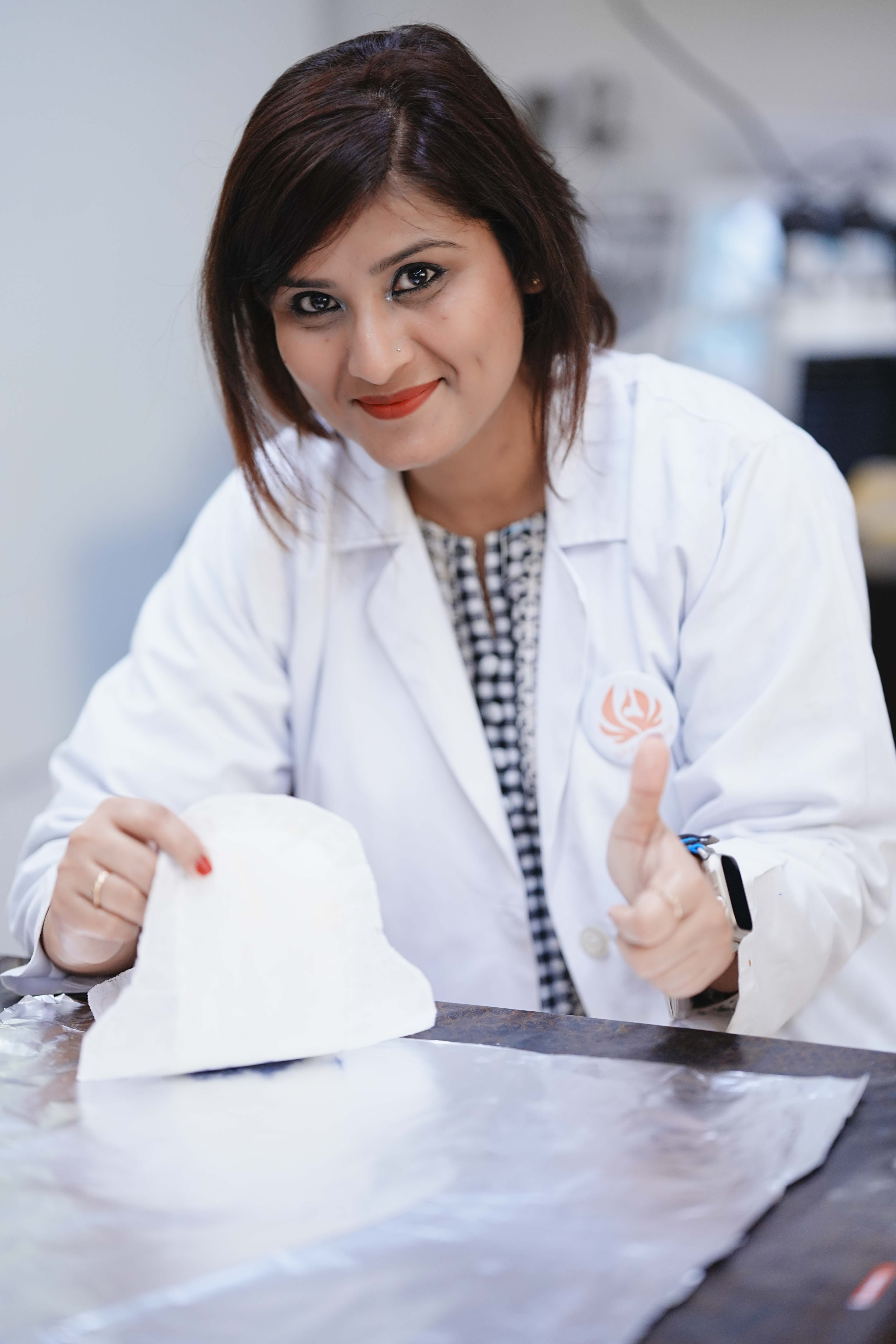 Mehreen is seen testing one of She-Guards products. — Photo via Mehreen