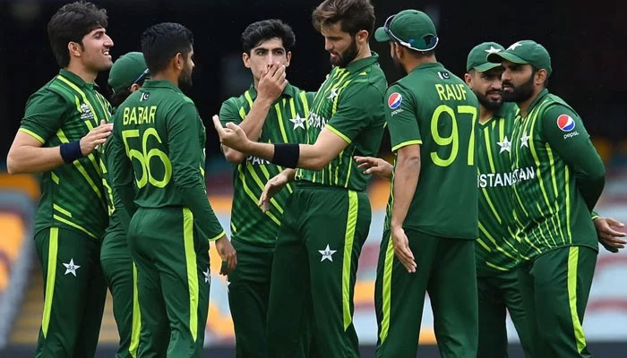 Pakistan's Shadab Khan celebrates with his teammates after managing to dismiss England's Joe Root off the bowling of Shaheen Afridi.  — Reuters/File