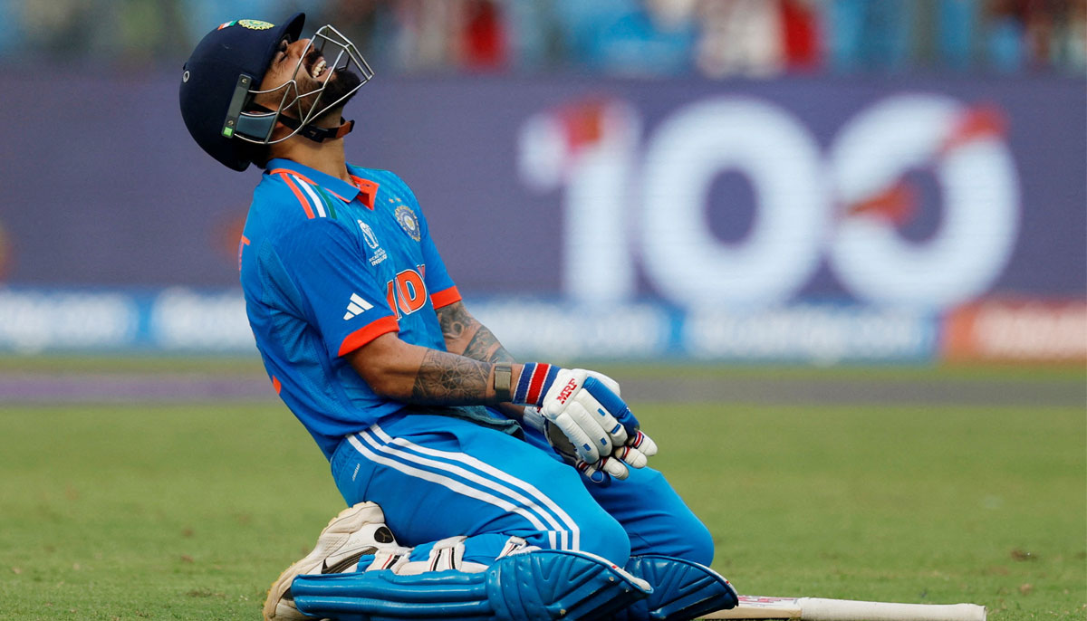 Cricket - ICC Cricket World Cup 2023 - Semi-Final - India v New Zealand - Wankhede Stadium, Mumbai, India - November 15, 2023 Indias Virat Kohli celebrates after reaching his 50th century, breaking Sachin Tendulkars record of most number of ODI centuries.—Reuters