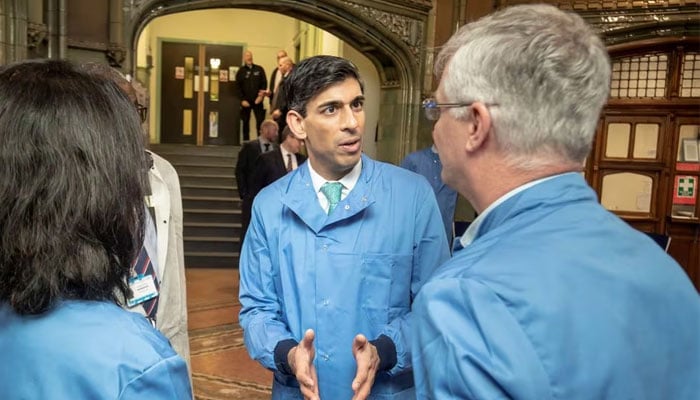 Britain's former Chancellor of the Exchequer Rishi Sunak visits the pathology lab at Leeds General Infirmary during the coronavirus (COVID-19) pandemic in Leeds, Britain on March 12, 2020. — Reuters