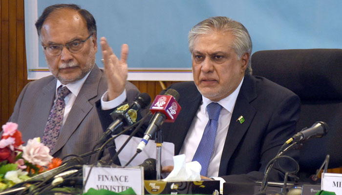 In this undated picture, Leader of the Opposition in the Senate, Senator Ishaq Dar, speaks at a press conference when he was still Finance Minister. — Online/File