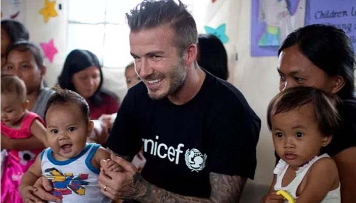 Photo David Beckham during his charity work with UNICEF