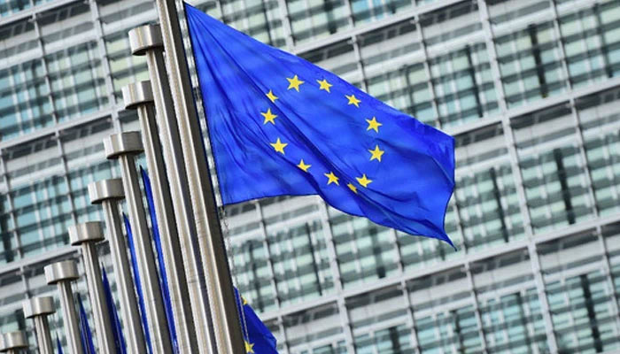 European flags fly outside the European Commission building, in Brussels, on May 8 2015. — AFP File