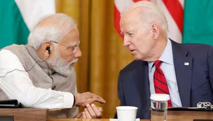US President Joe Biden and Indias Prime Minister Narendra Modi talk during a meeting with senior officials and CEOs of American and Indian companies in the East Room of the White House in Washington, US, June 23, 2023.—Reuters/file