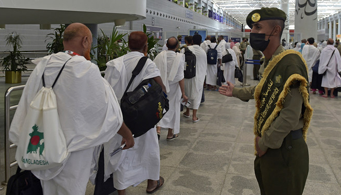 Muslim pilgrims arrive at King Abdulaziz International Airport in Saudi Arabias Red Sea coastal city of Jeddah on June 5, 2022, prior to the annual Haj pilgrimage in the holy city of Makkah. — AFP