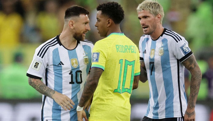 Argentinas Lionel Messi and Brazils Rodrygo clash before the delayed start of the World Cup South American Qualifiers match at Estadio Maracana, Rio de Janeiro, Brazil on November 21, 2023. — Reuters