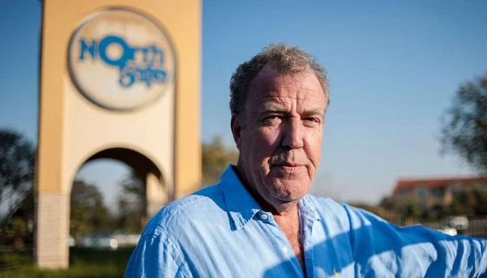 Former Top Gear presenter Jeremy Clarkson poses next to a South African taxi in this undated picture. — AFP/File