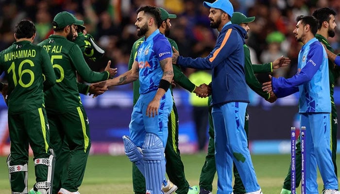 Pakistani and Indian players shake hands after the ICC mens Twenty20 World Cup 2022 cricket match at Melbourne Cricket Ground in Melbourne on October 23, 2022. — AFP