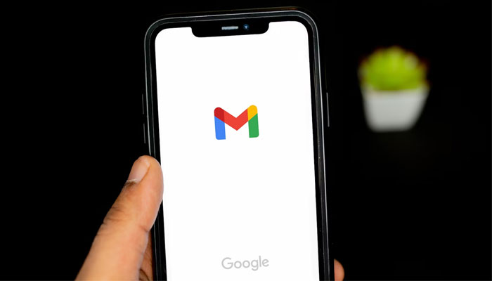 This picture shows the Gmail logo displayed on a phone screen. — Unsplash