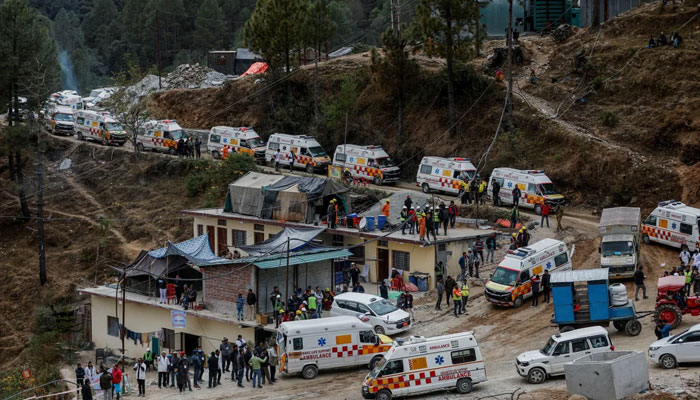 Ambulances wait in line near the operation to free the trapped workers in Uttarakhand, India, November 28, 2023.—Reuters