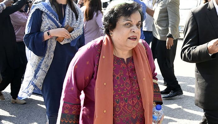 Former leader of PTI Shireen Mazari leaving Election Commission office in Islamabad. — Online.