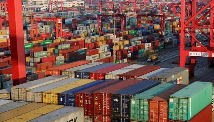 Representational image of containers being placed in a port.  — Reuters/File
