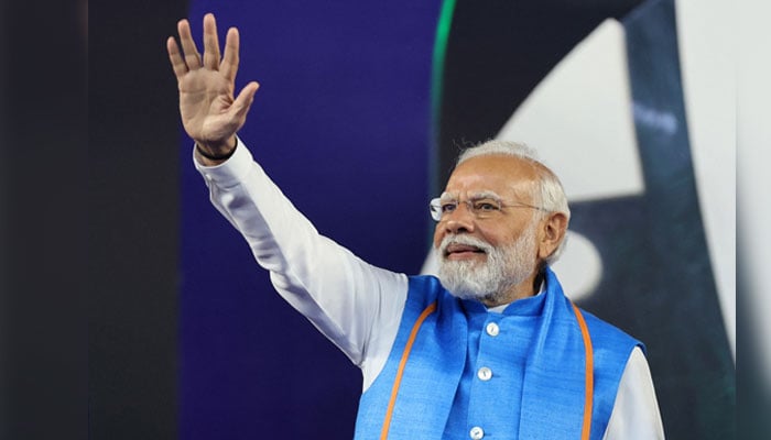 Indian Prime Minister Narendra Modi waves to the crowd during the presentation ceremony of the ICC Cricket World Cup 2023 final between India and Australia at the Narendra Modi Stadium in Ahmedabad, India - Reuters