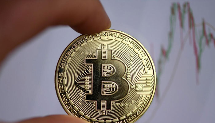 The photo shows a physical imitation of a Bitcoin in Dortmund, western Germany. — AFP file