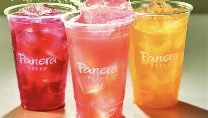 Paneras Charged Lemonades in Fuji Apple Cranberry, Strawberry Lemon Mint, and Mango Citrus.—Panera