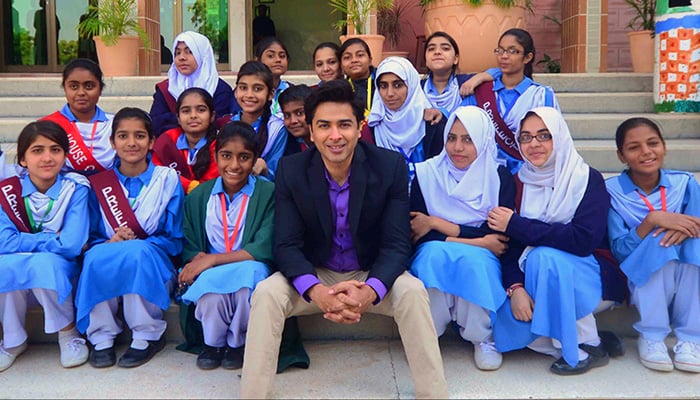 Zindagi Trust founder Shehzad Roy poses for a picture with students. —Zindagi Trust