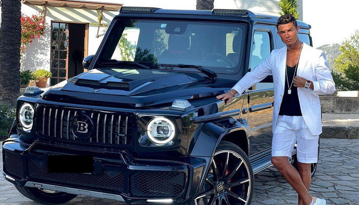 Cristiano Ronaldo posing with one of his high-end cars. — Instagram/cristiano