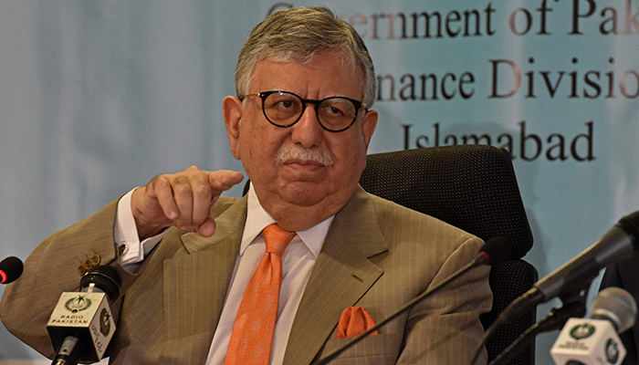 Former finance minister Shaukat Tarin gestures during a pre-budget press conference in Islamabad on June 10, 2021. — AFP